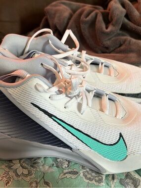 Nike White Sneakers with Teal Swoosh